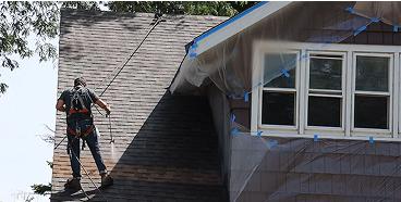 Employee working on roof